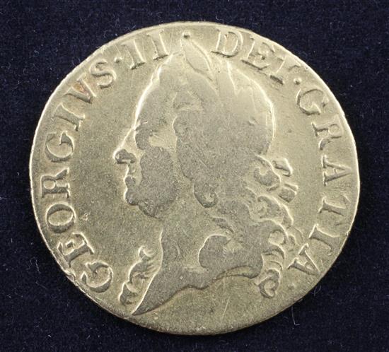 A George II 1750 gold guinea,